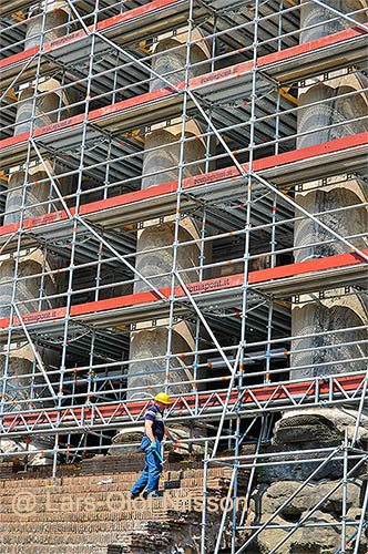 Construction worker doing restoration work in the Forum Romanum, Rome, Italy