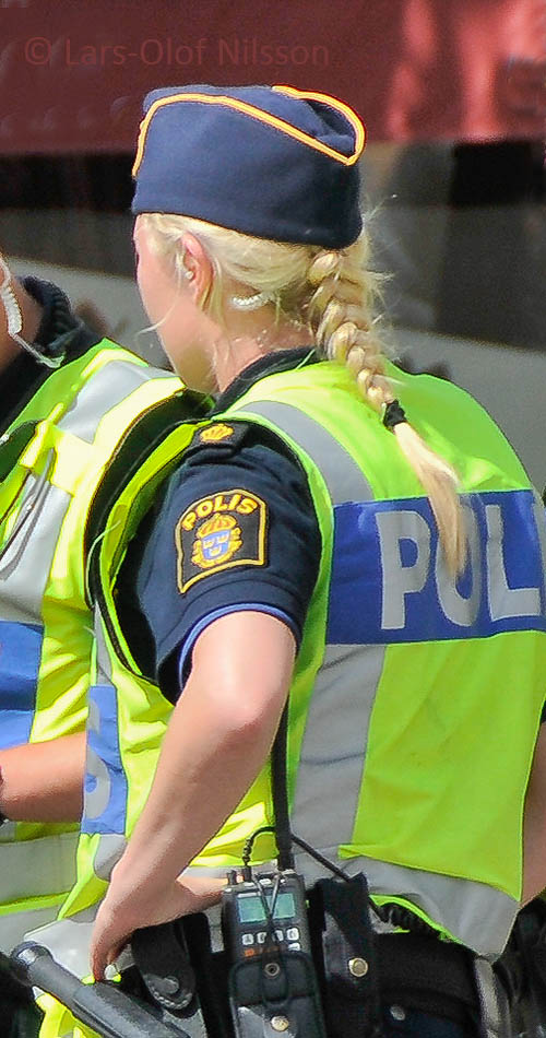 Policewoman seen from behind