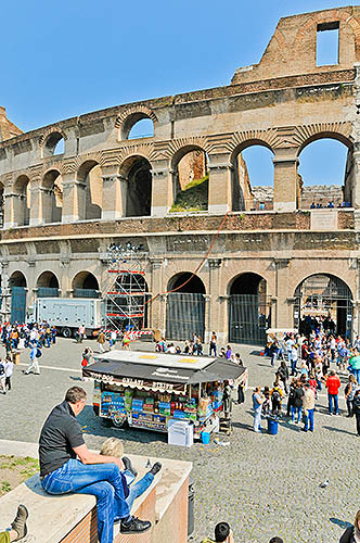 Tourists outside the Colosseum in Rome, Italy